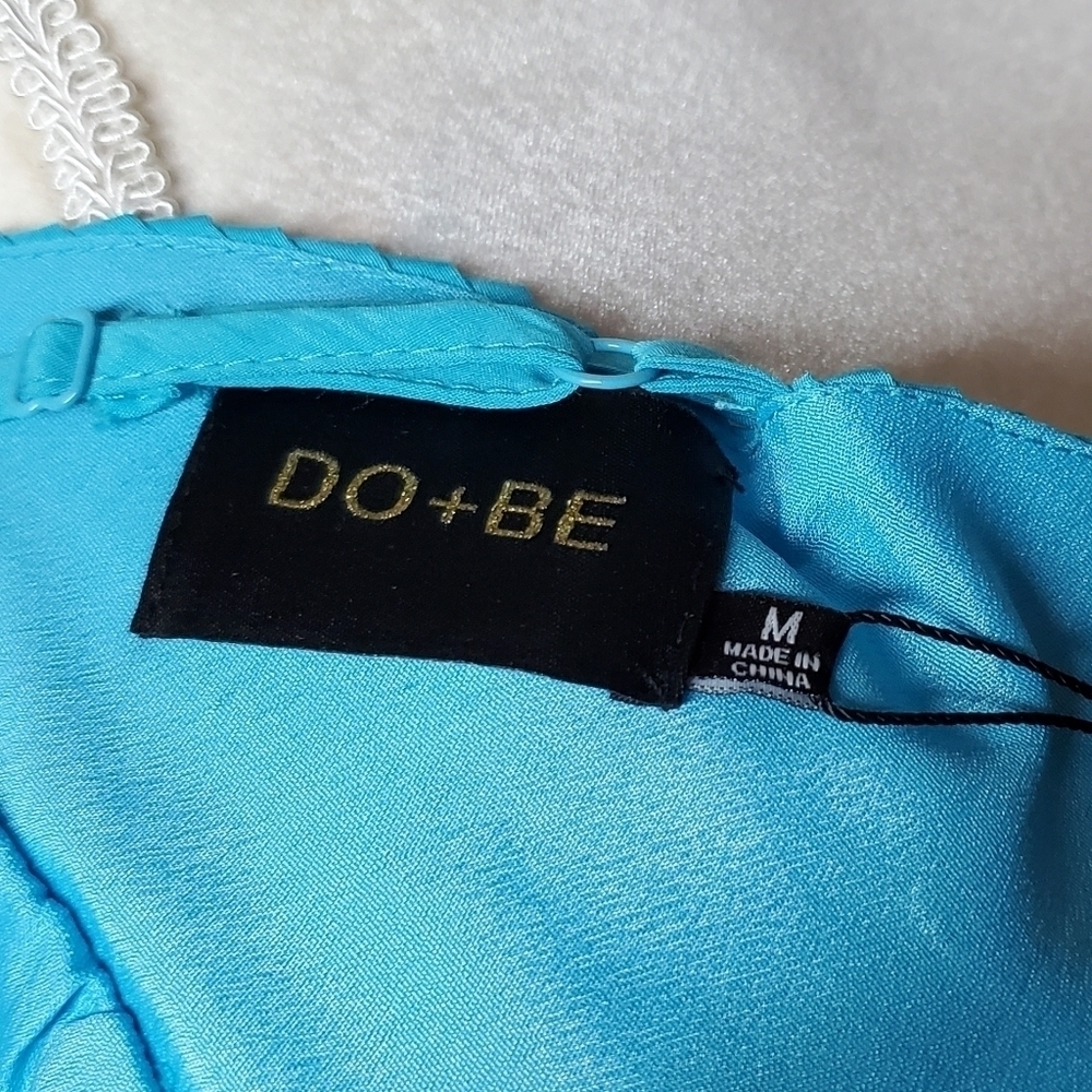 DO+BE Aqua Blue Pleated Deep V-neck Racerback Backless Tie-Waist Wide Leg Romper - Picture 14 of 15